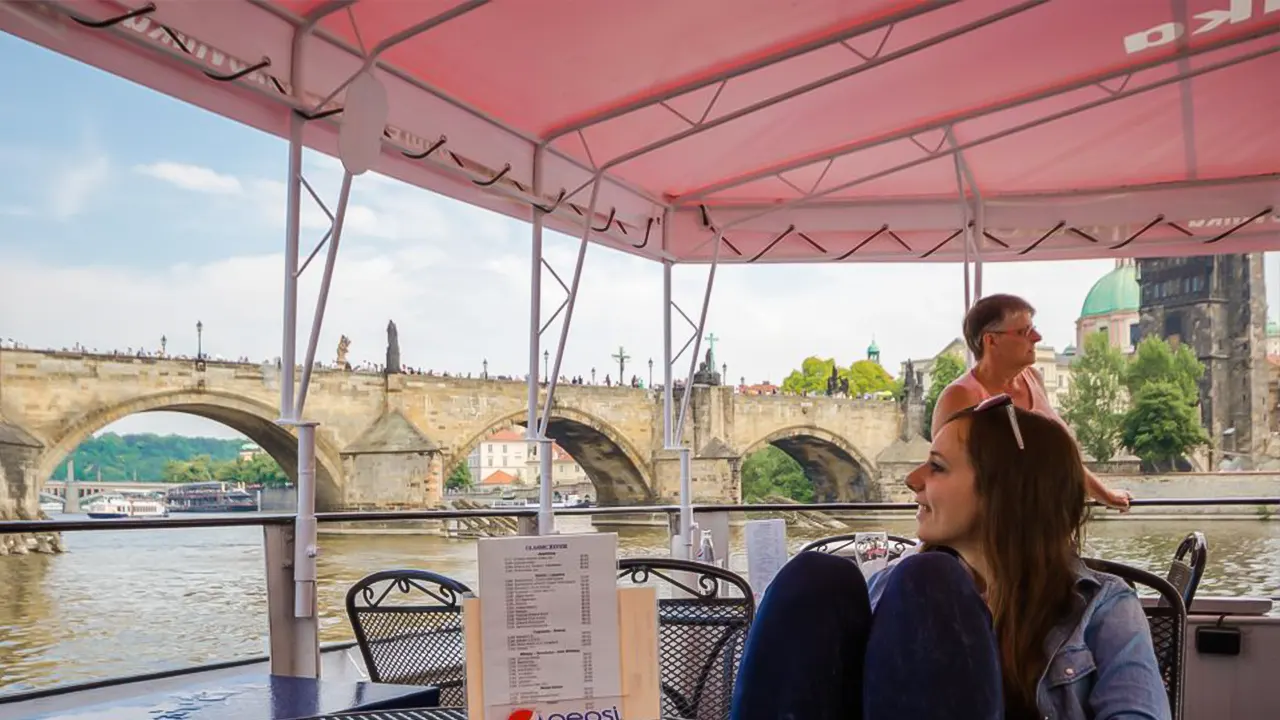 Hop-on-hop-off bus tour and Vltava river cruise