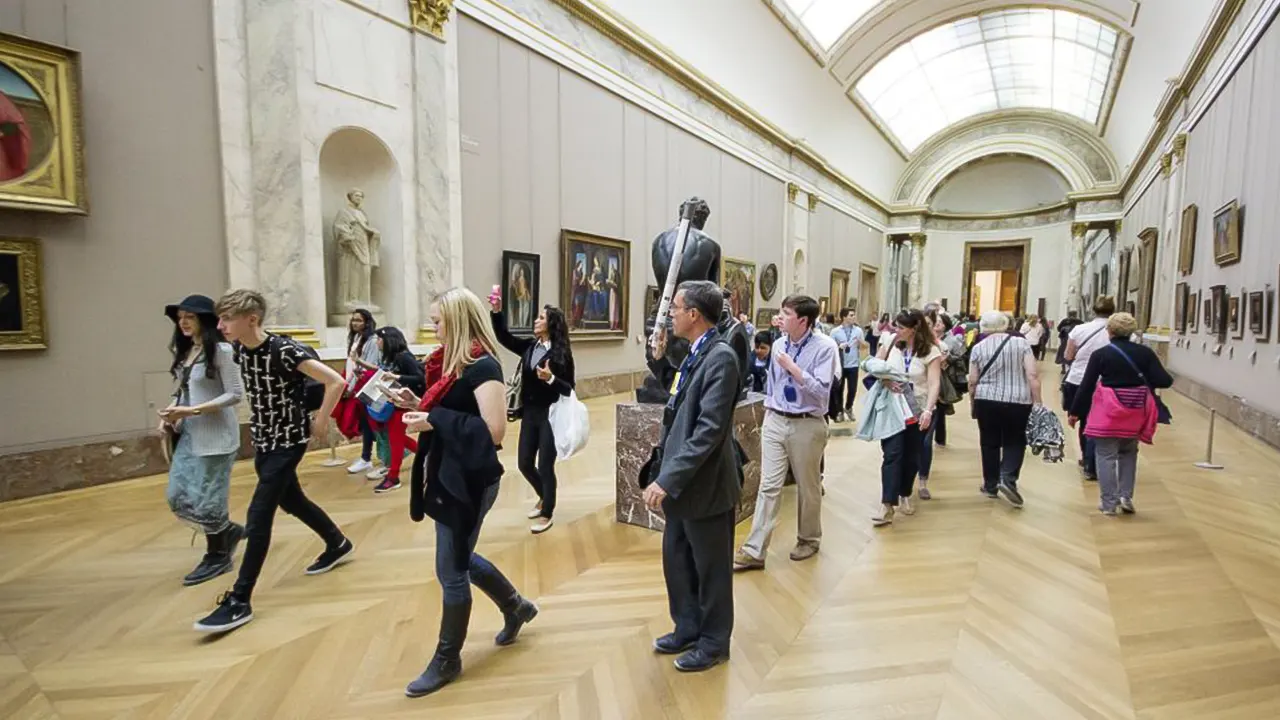 Louvre museum with a tour guide