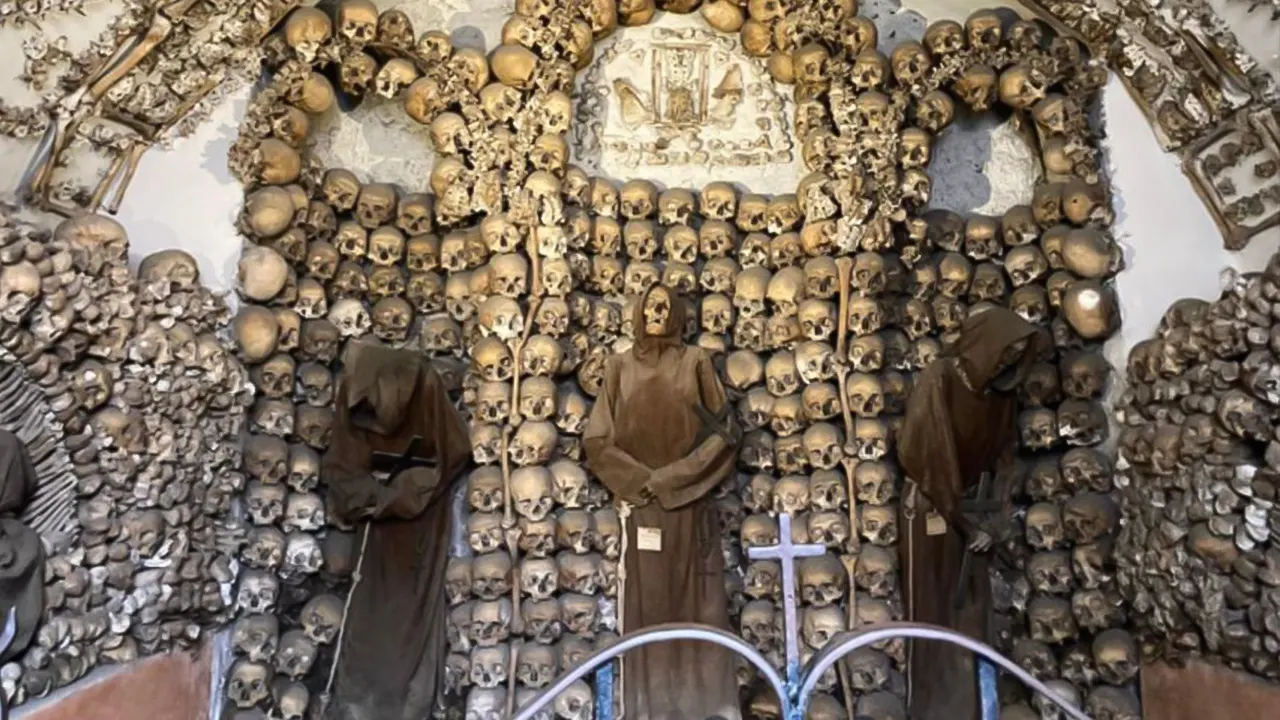 Catacombs with a tour guide by Transport